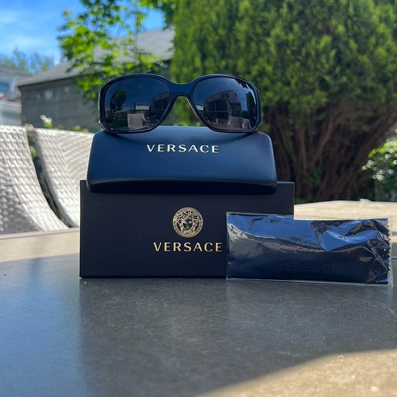 Versace Accessories - Versace black plastic sunglasses with stone details on temples